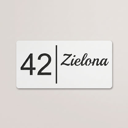 Biała tabliczka, czarne litery